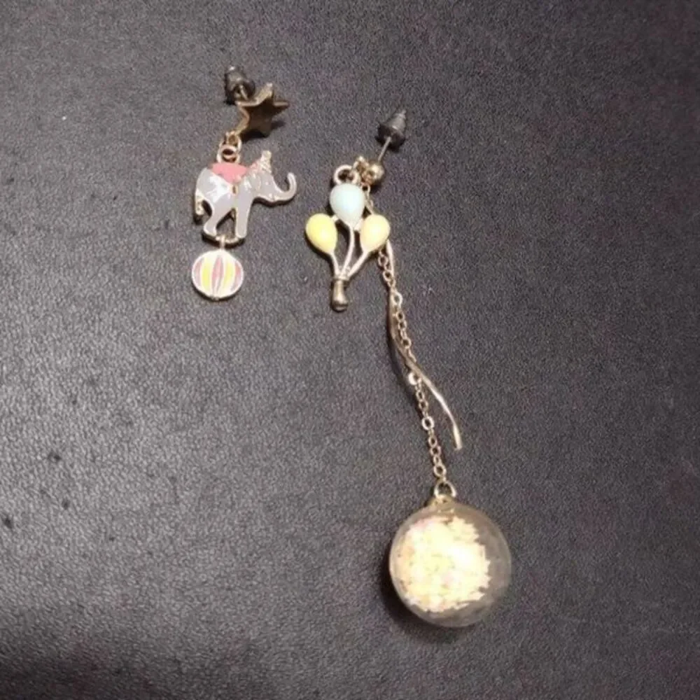 Circus high low earrings